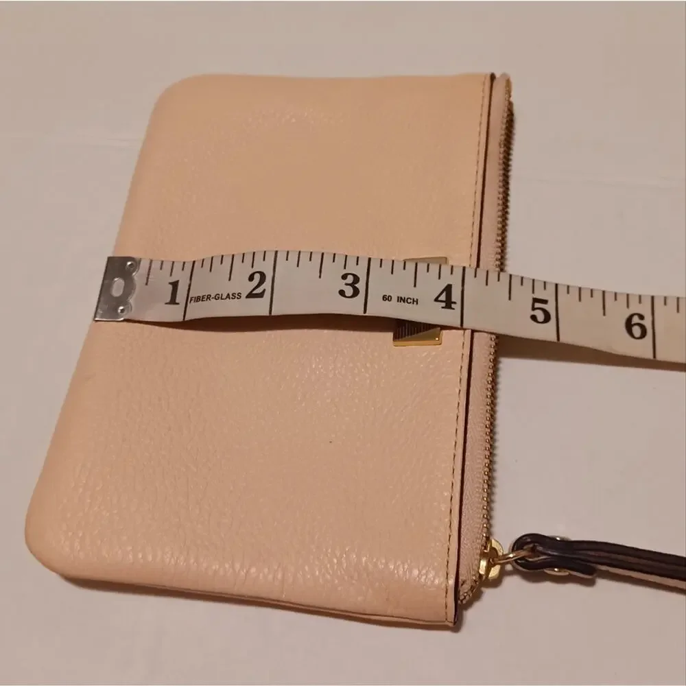Kate Spade New York Pink Tone Wristlet.